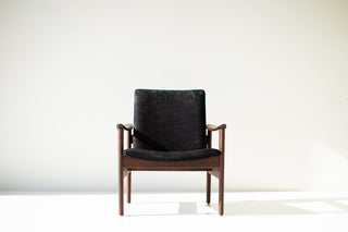 Front view of the walnut Lawrence Peabody 2360P occasional chair with black upholstered seat and back