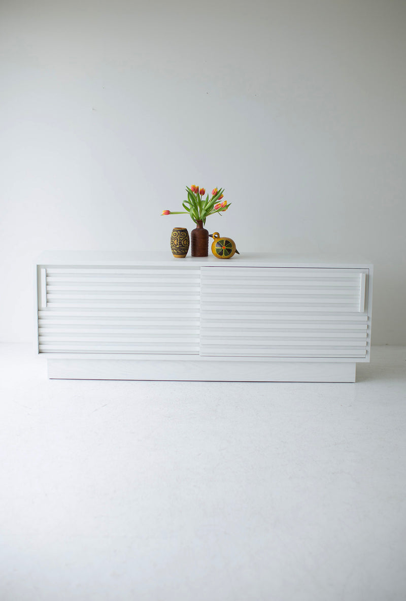 Modern luxury white credenza in a bright interior