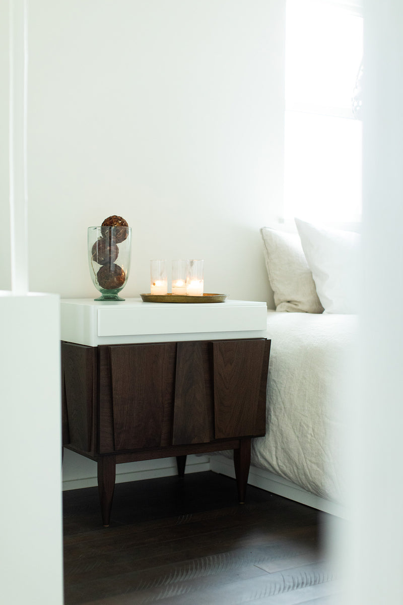 A pair of modern luxury Eiger nightstands in a bright bedroom