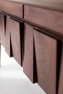Close-up of the hand-applied matte finish on the modern luxury walnut Eiger credenza