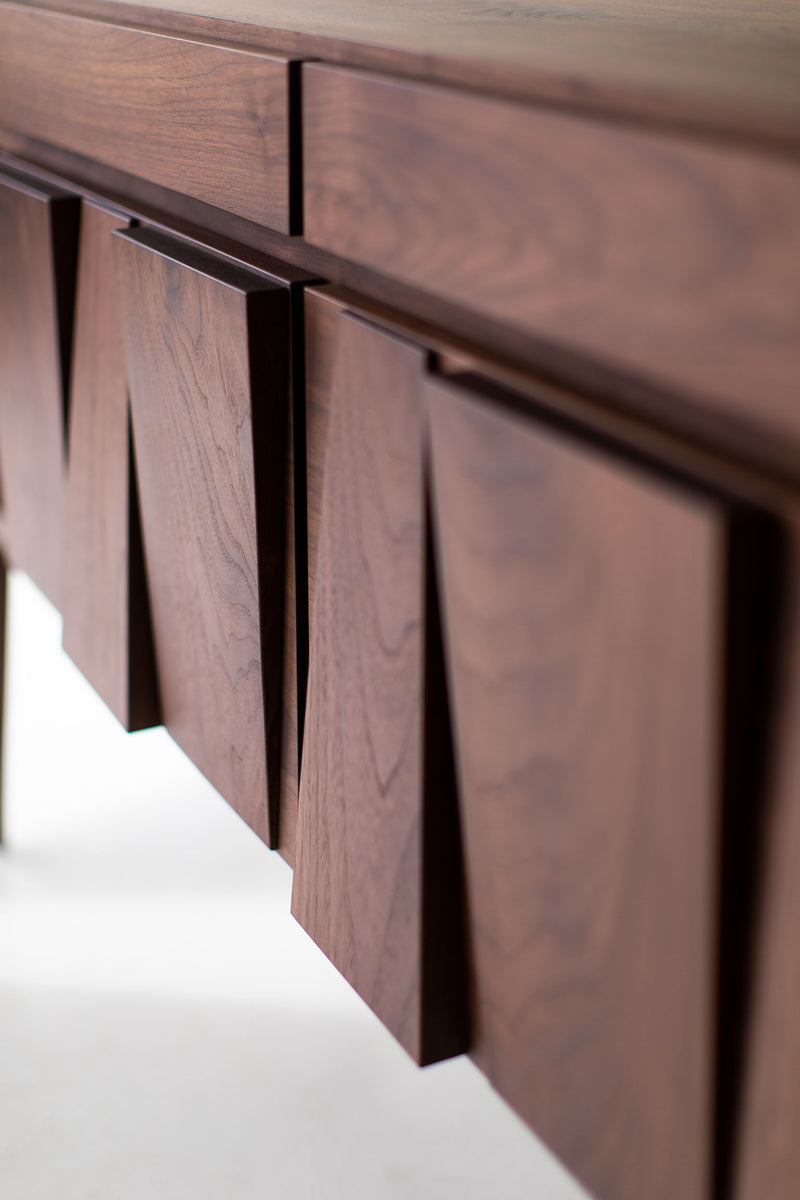Close-up of the hand-applied matte finish on the modern luxury walnut Eiger credenza