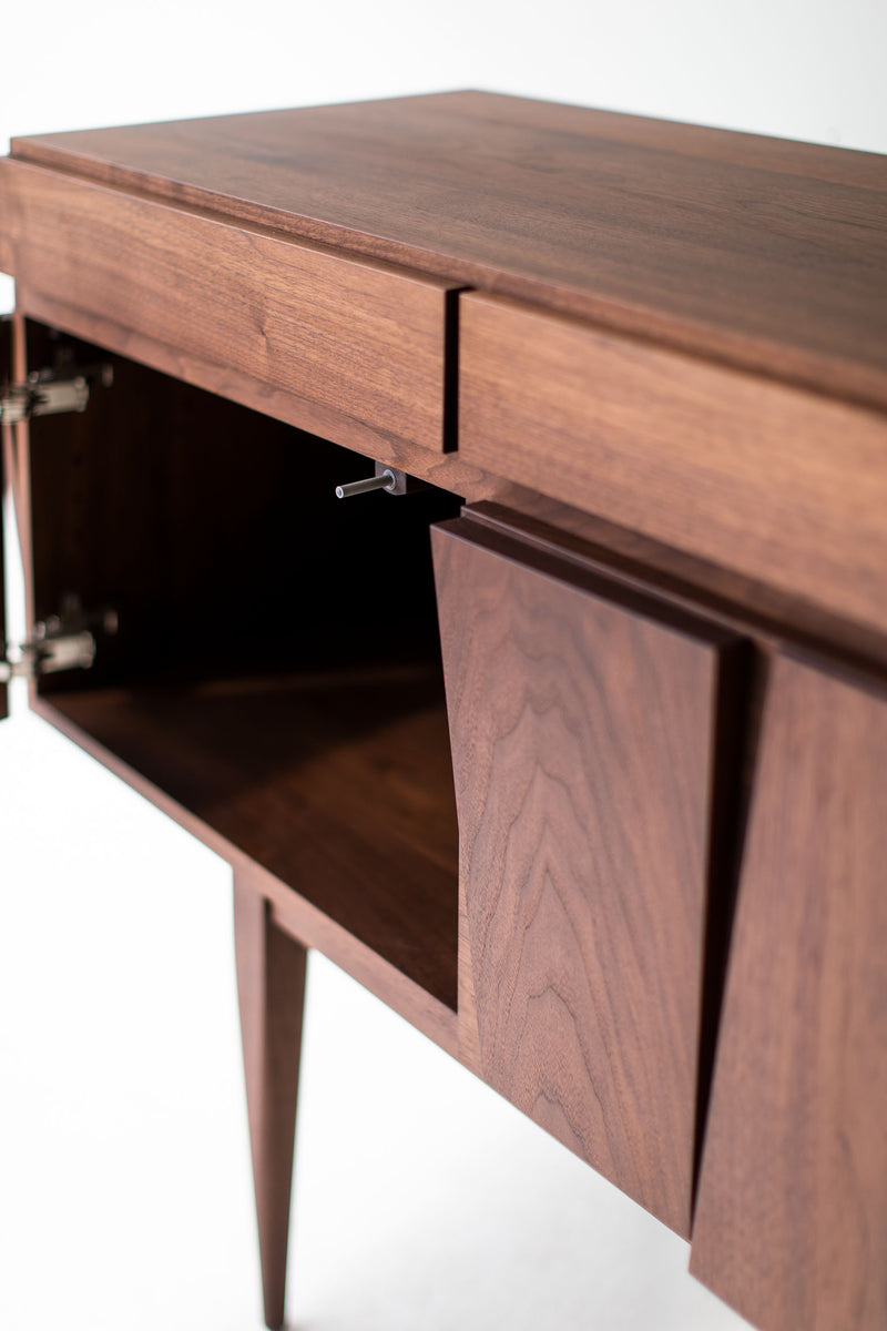 Modern luxury walnut Eiger credenza styled in a contemporary living room