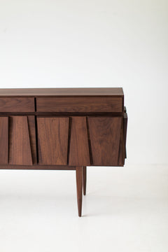 Detail of the solid walnut grain on the modern Eiger luxury credenza by Craft Associates®