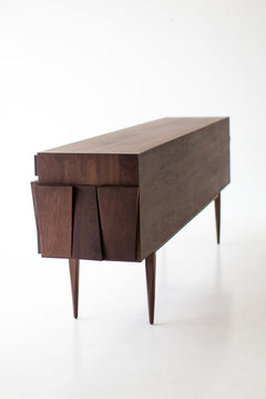 Close-up of the recessed door detailing on the modern walnut Eiger luxury credenza