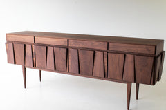 Modern luxury walnut Eiger credenza by Craft Associates® styled in a bright modern interior
