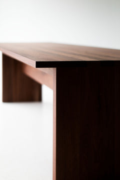 Modern walnut extendable dining table, The Toko, shown with center leaf added