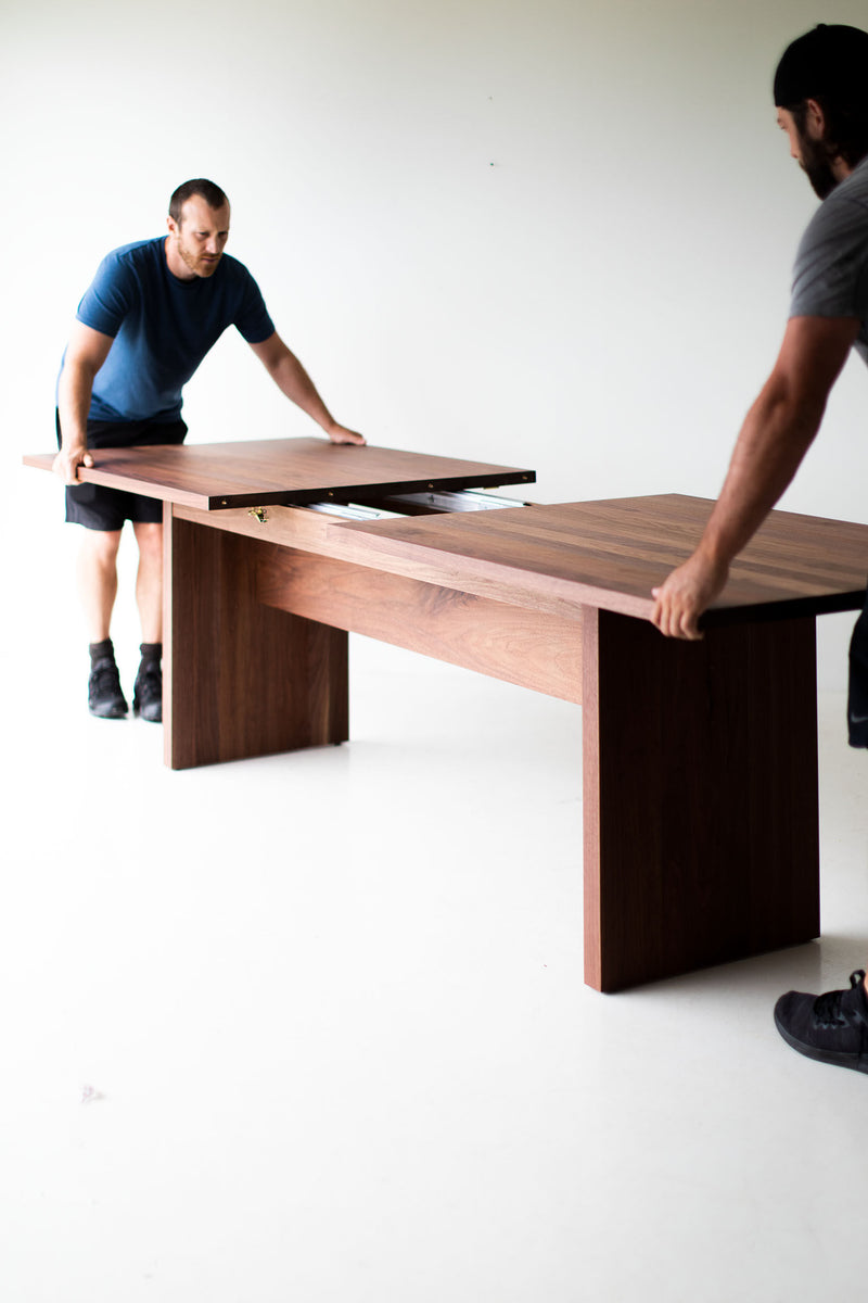 Detail of the solid walnut legs and base, The Toko dining table