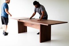 The Toko extendable walnut dining table viewed from above