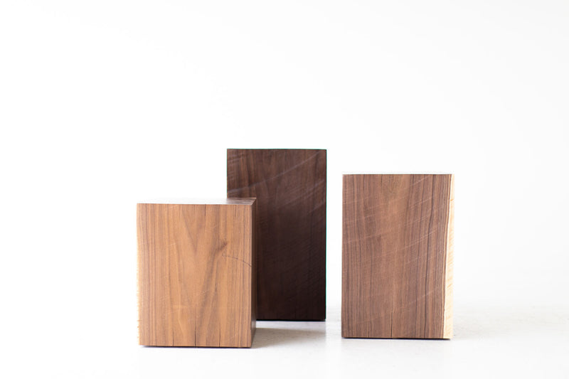 Walnut stump table styled as a nightstand