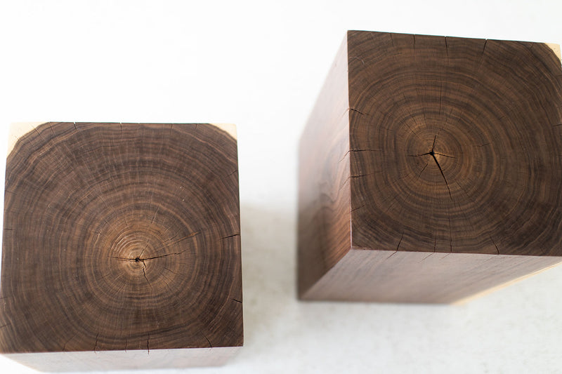Walnut side table styled beside a sofa