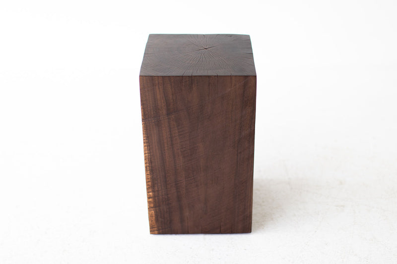 Walnut stump table styled as a stool