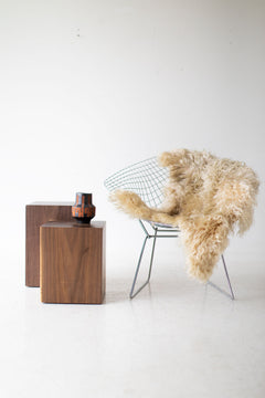 Modern wood side table styled in a living room