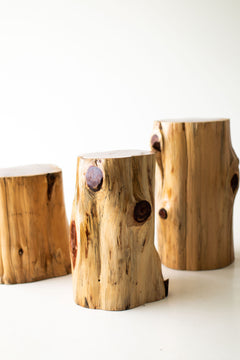 Natural outdoor red cedar stump tables, close view