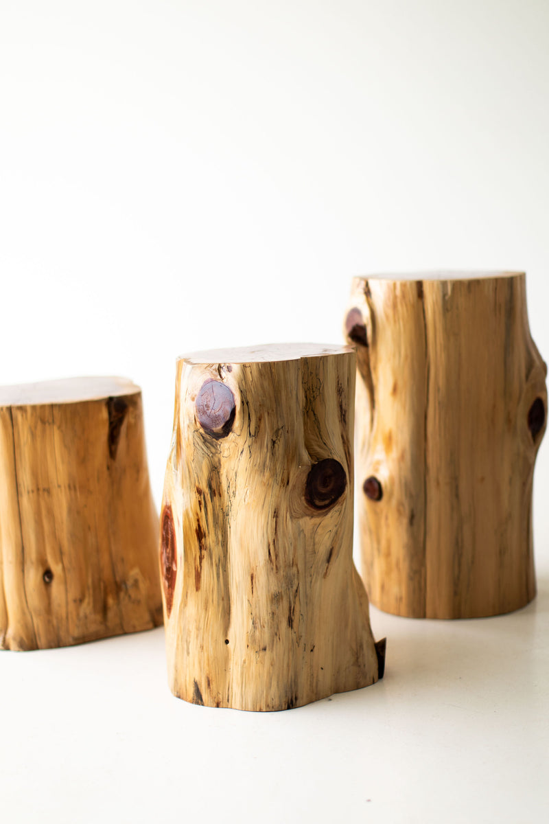 Natural outdoor red cedar stump tables, close view