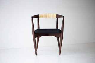 Modern luxury walnut and cane dining chair by Lawrence Peabody for Craft Associates, front view