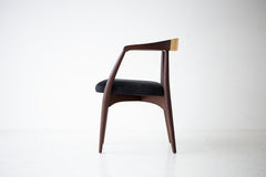 Detail of the hand-steamed and bent walnut frame