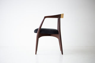 Detail of the hand-steamed and bent walnut frame