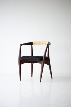Detail of the cane weave pattern across the chair back