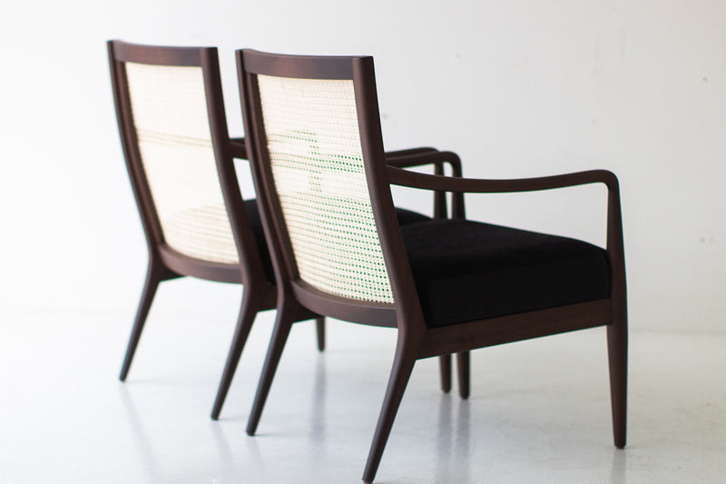 Angled view of the modern Peabody cane back armchair in walnut