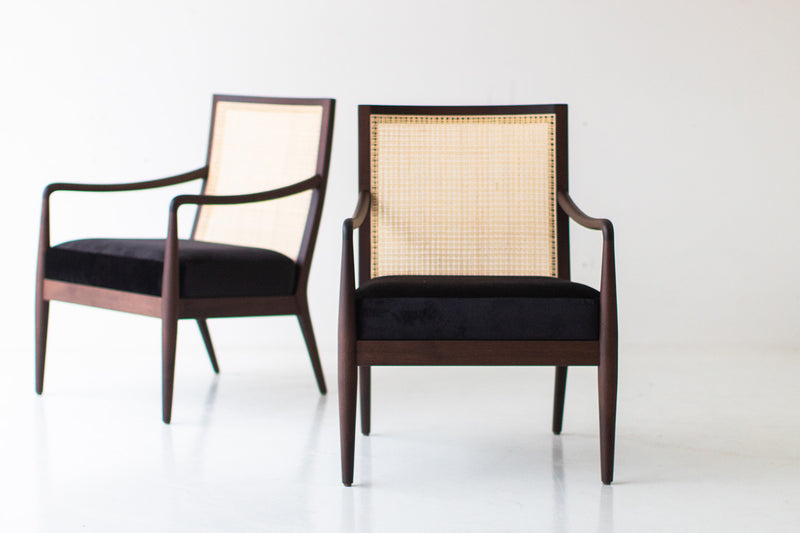 Close-up of the solid walnut frame and woven cane