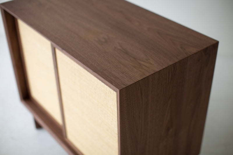 Close-up of the hand-caned door on the credenza