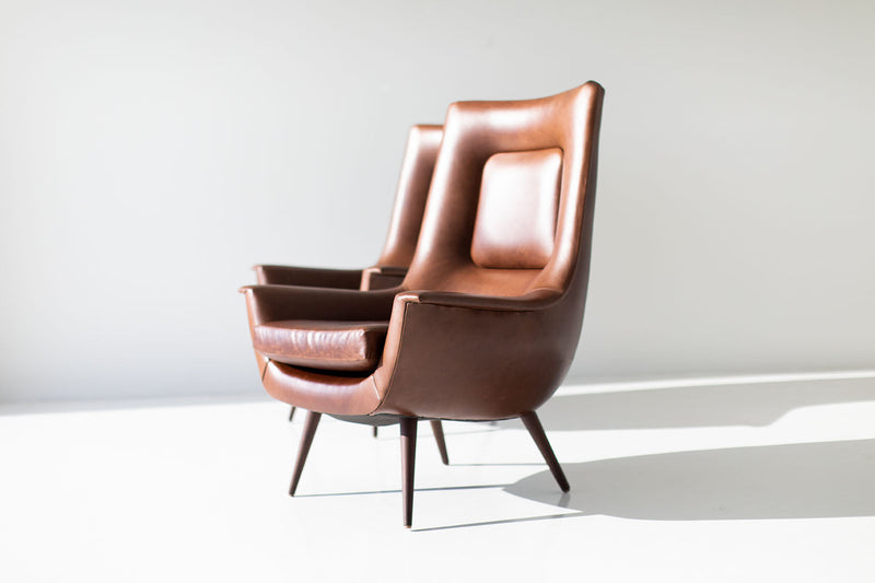 Modern luxury Peabody high back wing chair with a solid walnut frame by Craft Associates®, front view