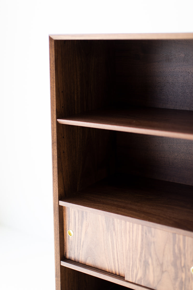 Detail of the sliding door hardware on the bookcase