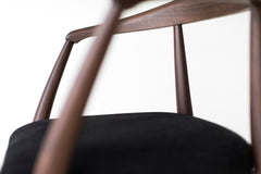 Front view of the leather seat on the Peabody dining arm chair