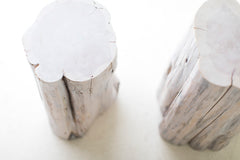 Bertu Home tree stump table showing natural wood grain and bark edge