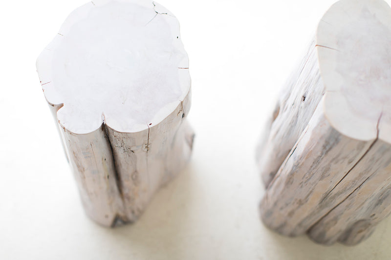 Bertu Home tree stump table showing natural wood grain and bark edge