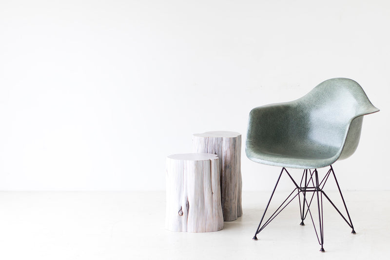 Tree stump table styled as a side table in a living room