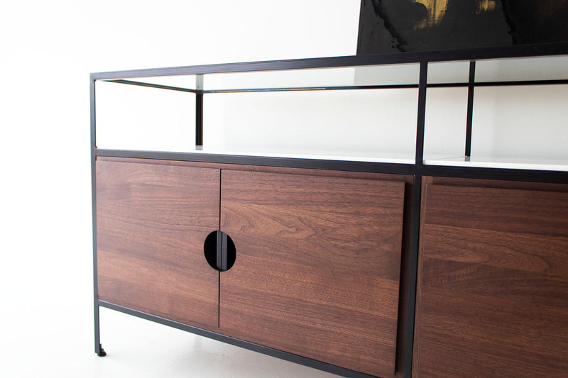Modern luxury Cali Collection walnut credenza shown at an angle