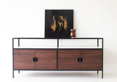 Close-up of the glass inset top on the luxury walnut credenza