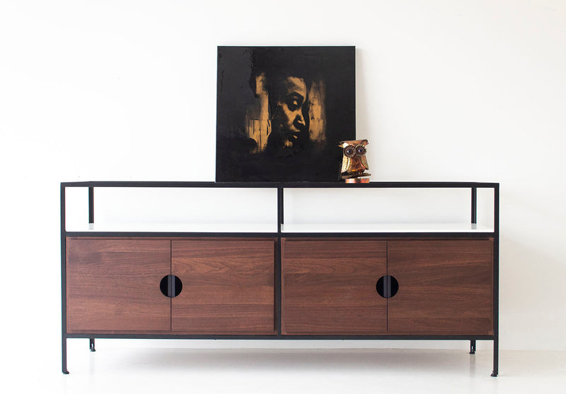 Close-up of the glass inset top on the luxury walnut credenza