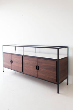 Close-up of the white lacquered shelf on the luxury credenza