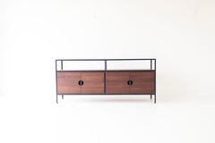 Modern luxury walnut and steel credenza styled in an industrial modern space