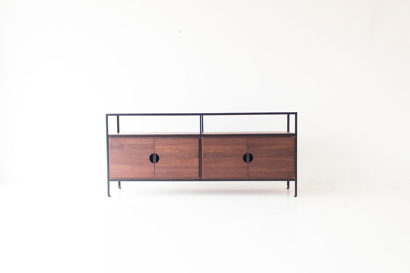 Modern luxury walnut and steel credenza styled in an industrial modern space