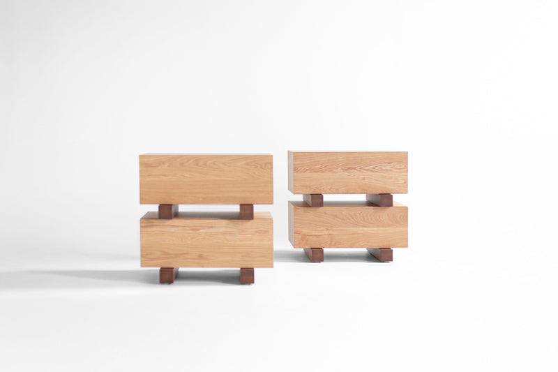Side profile of a modern luxury white oak nightstand with caramel accent