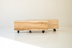 Aspen modern wood coffee table on castors, front view