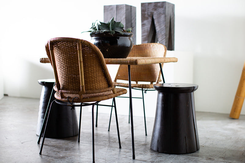 Modern maple stool used as a side table