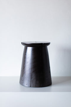Hand-sculpted shape of the stool
