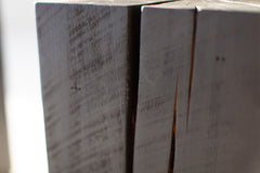 Bertu Home burnt maple stump table shown at an angle
