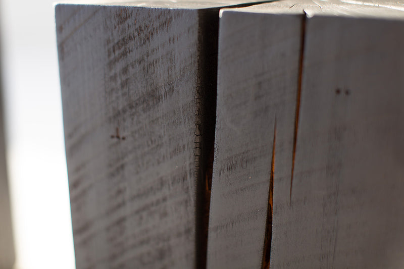 Bertu Home burnt maple stump table shown at an angle