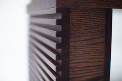 Cicely oak bench shown at an angle