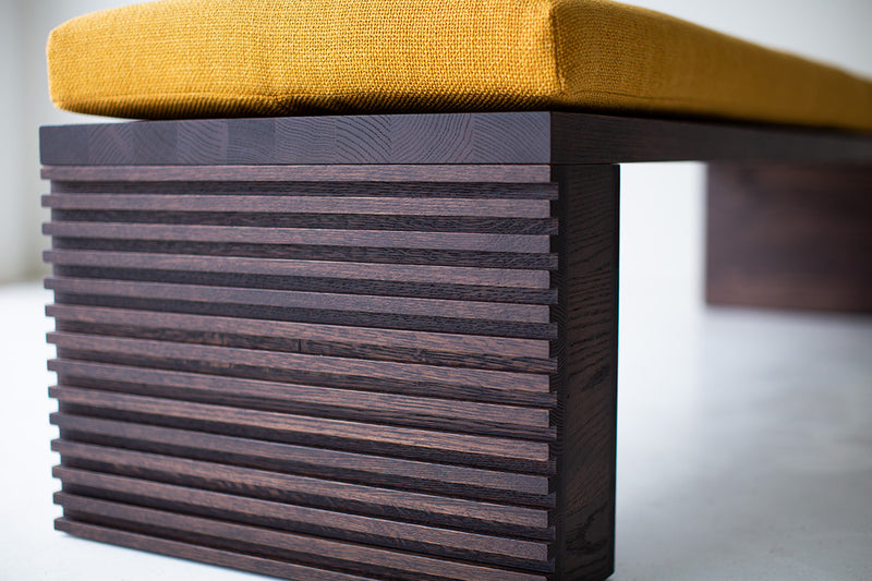 Detail of the chunky, horizontal-pattern oak leg