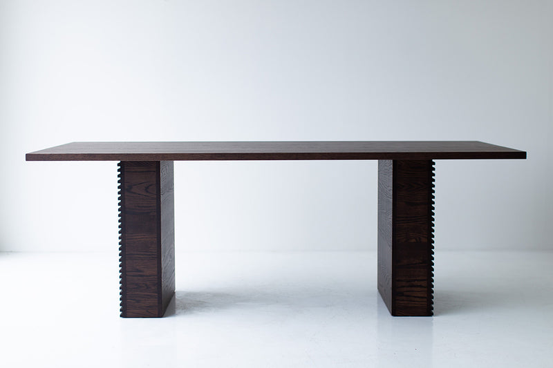 Modern luxury Cicely dining table in solid red oak with a walnut finish, front view