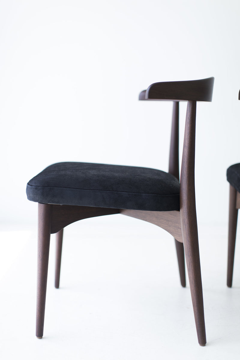 Set of Lawrence Peabody dining chairs styled around a table
