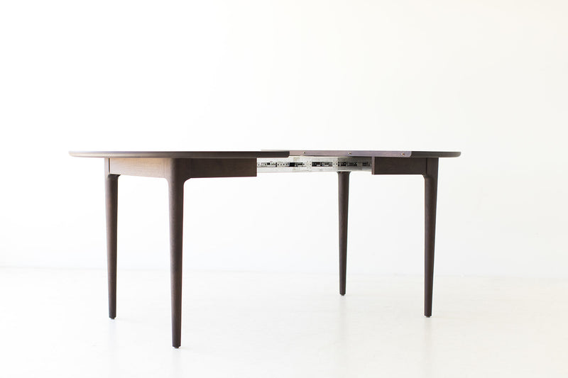 Side profile of the Lawrence Peabody walnut dining table