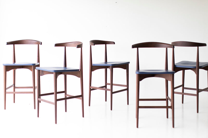 Modern luxury Lawrence Peabody walnut bar stool, front view