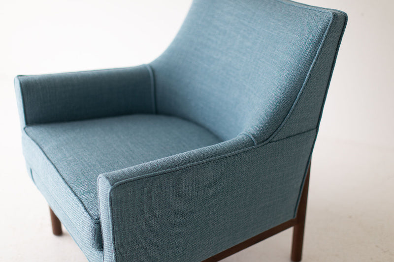 Angled view of the modern Peabody bracket back lounge chair